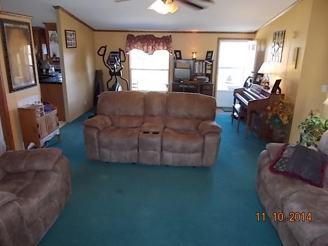 548 Rome Road Riddleton, TN 37151 - Photo 11 of 20 a living room with furniture and a flat screen tv