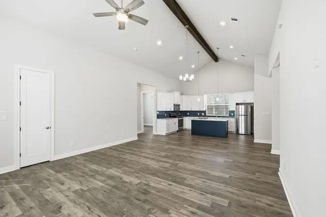 a view of kitchen and kitchen with a sink