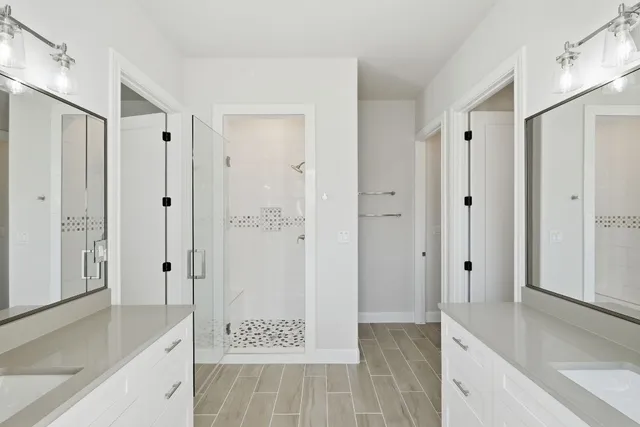 a bathroom with a shower and a tub