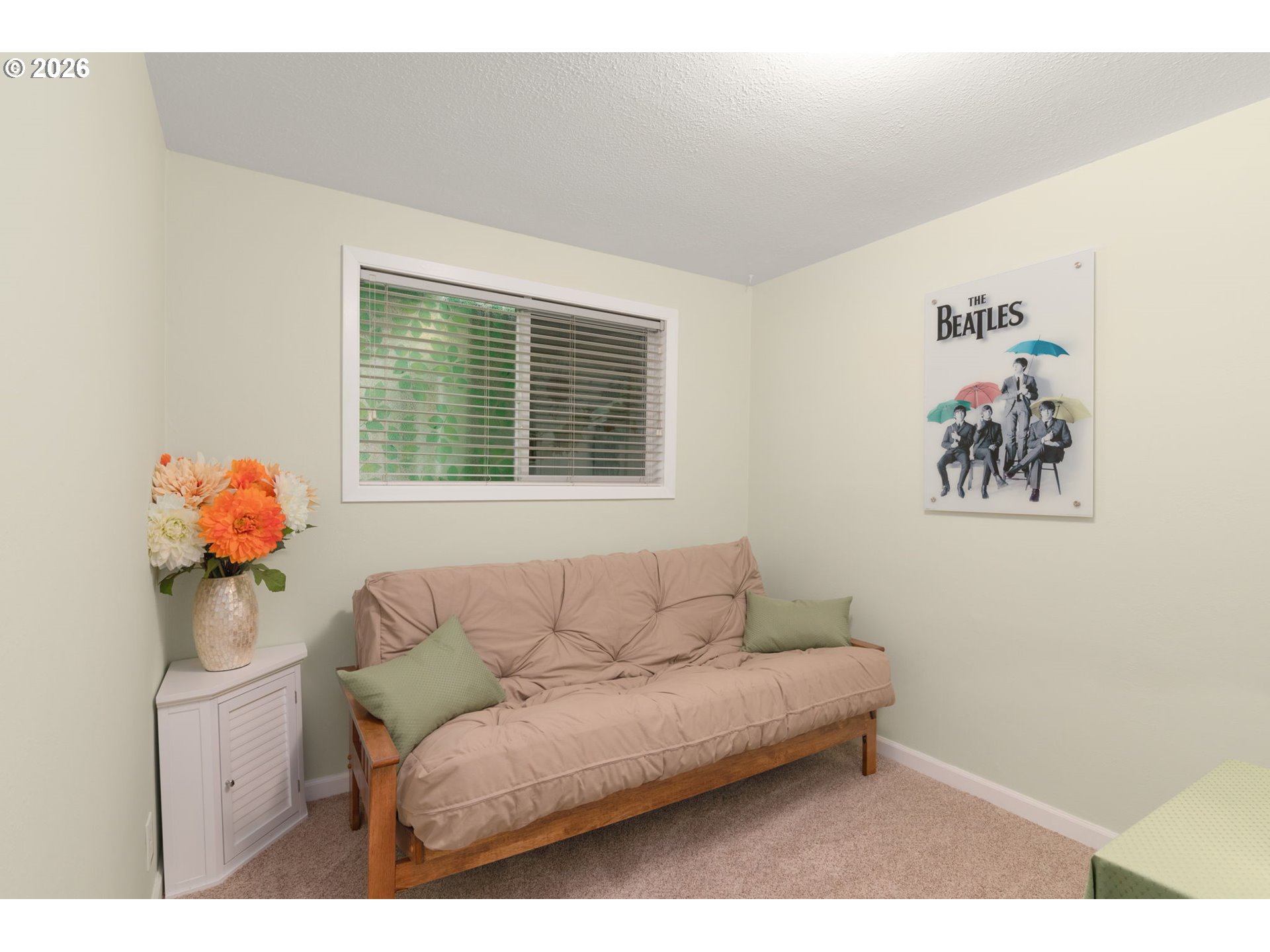 12605 Southeast Holgate Boulevard Portland, OR 97236 - Photo 22 of 43 a living room with furniture and a window