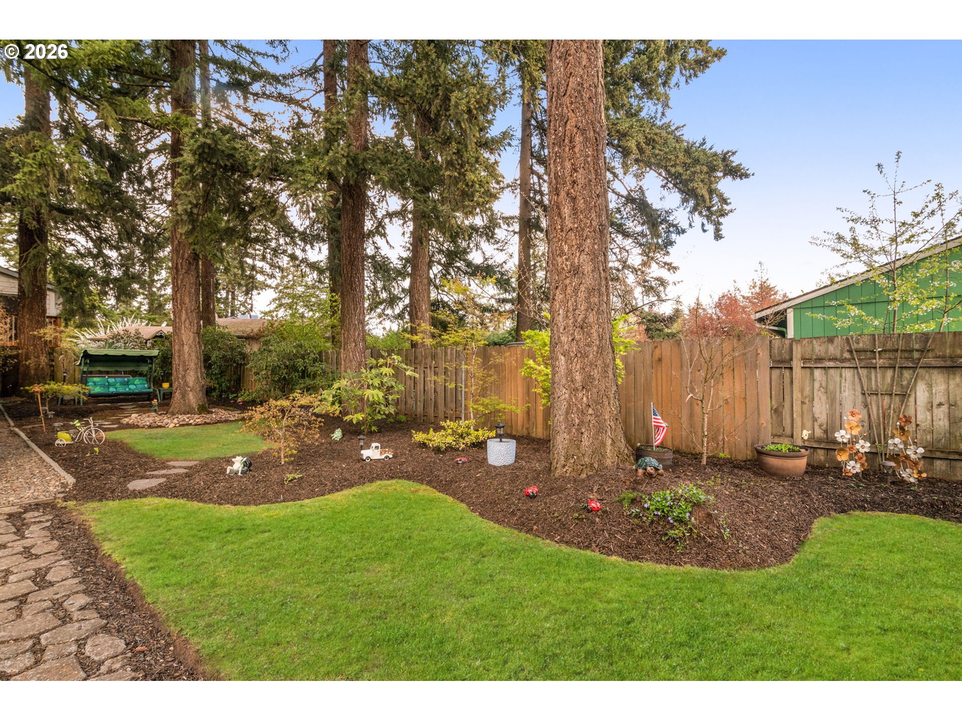 12605 Southeast Holgate Boulevard Portland, OR 97236 - Photo 35 of 43 a view of a backyard