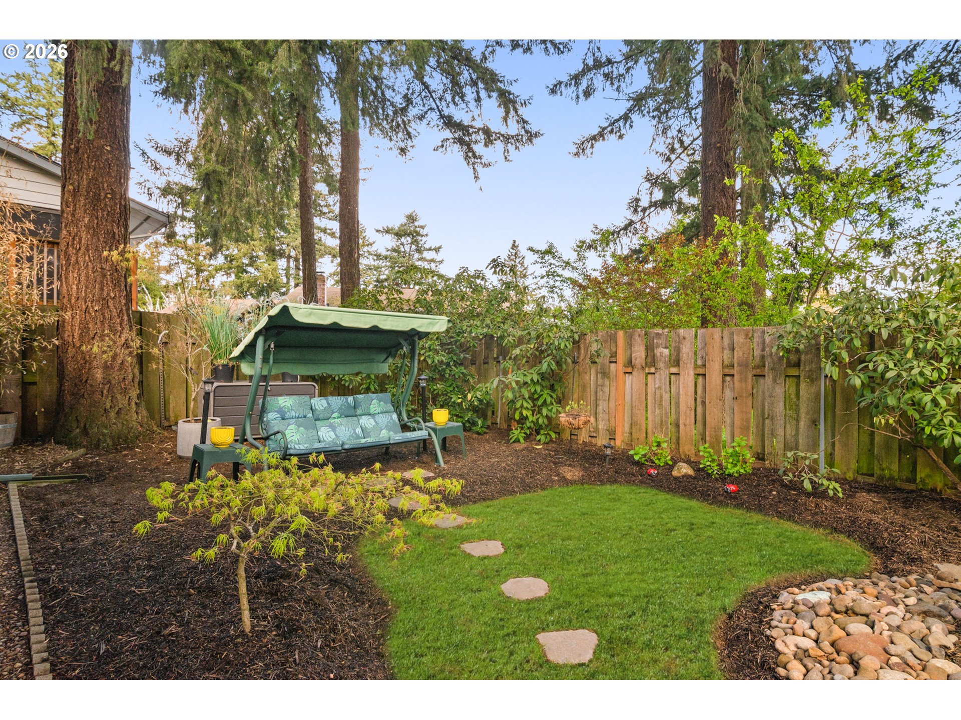 12605 Southeast Holgate Boulevard Portland, OR 97236 - Photo 39 of 43 a view of a back yard of the house