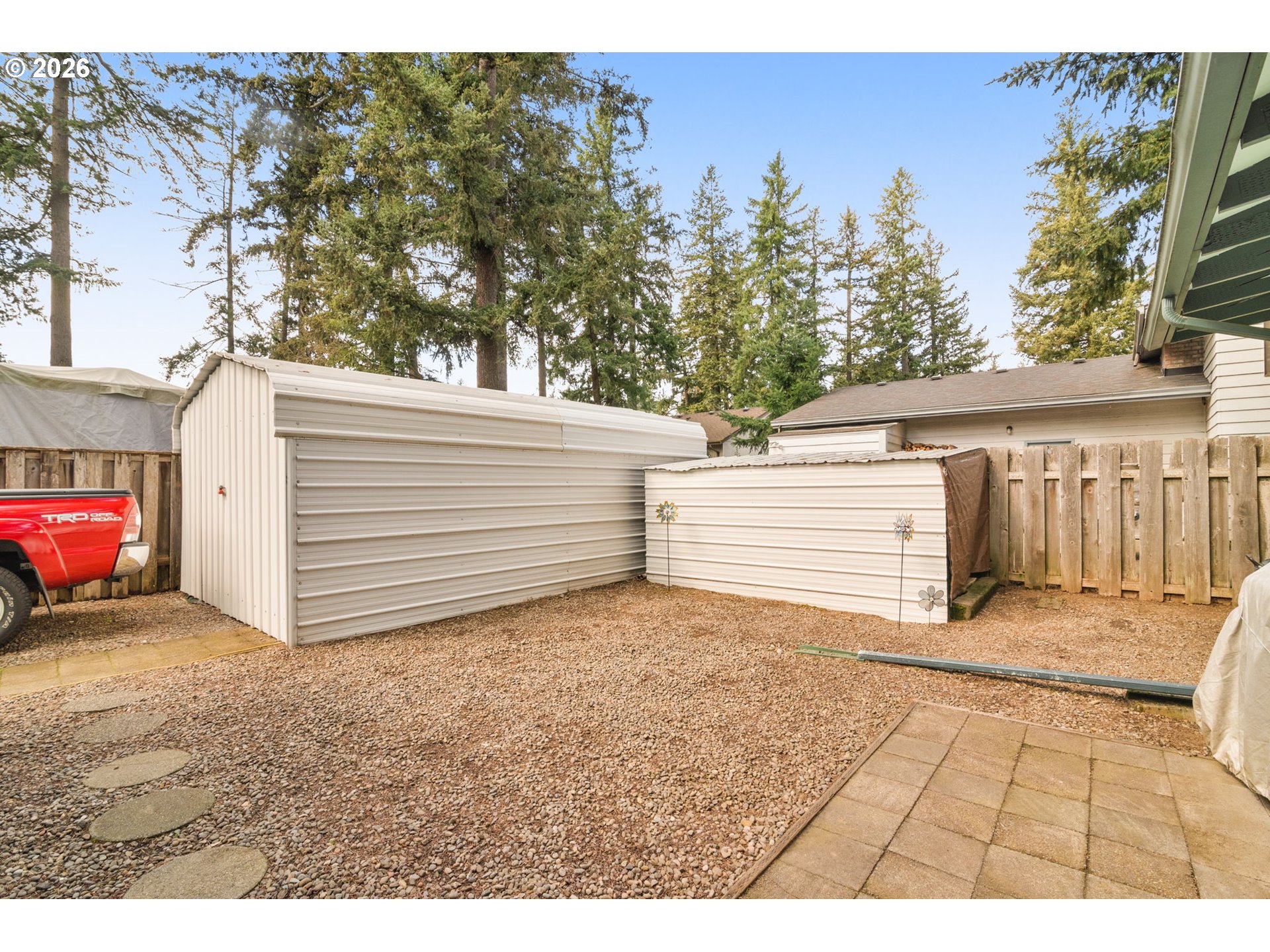 12605 Southeast Holgate Boulevard Portland, OR 97236 - Photo 40 of 43 a view of a house with a yard