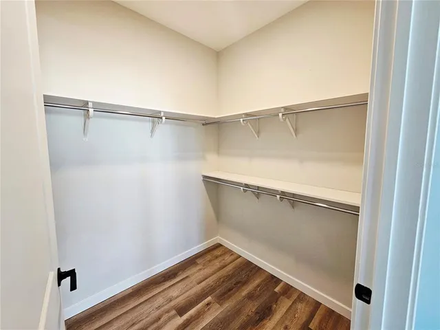 a view of an empty walk in closet