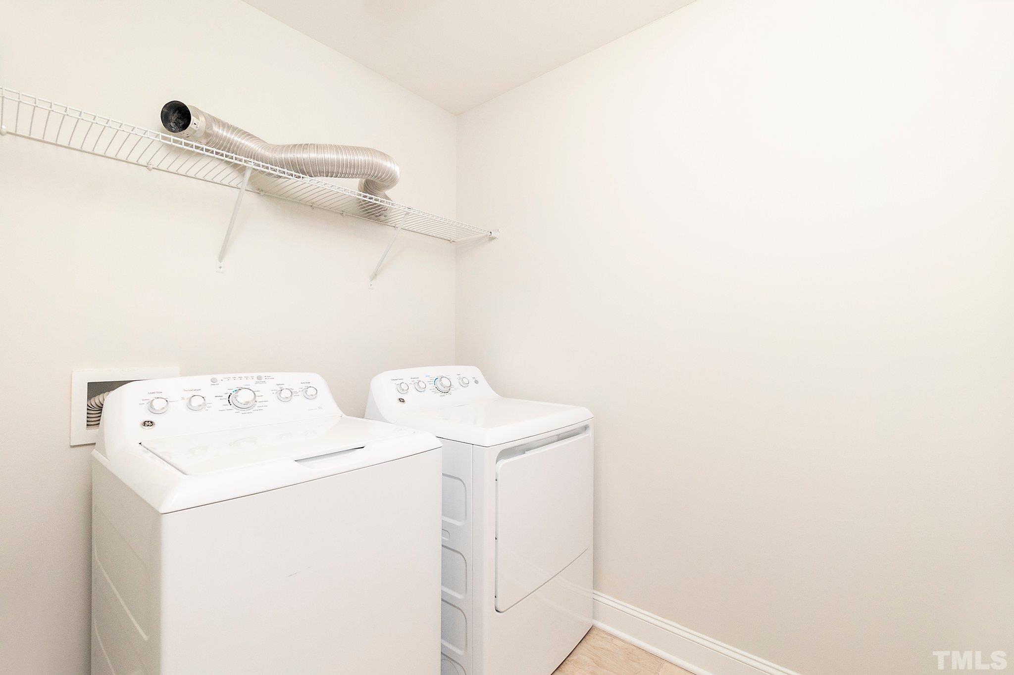 4401 Glengrove Road Raleigh, NC 27616 - Photo 20 of 26 a utility room with dryer and washer