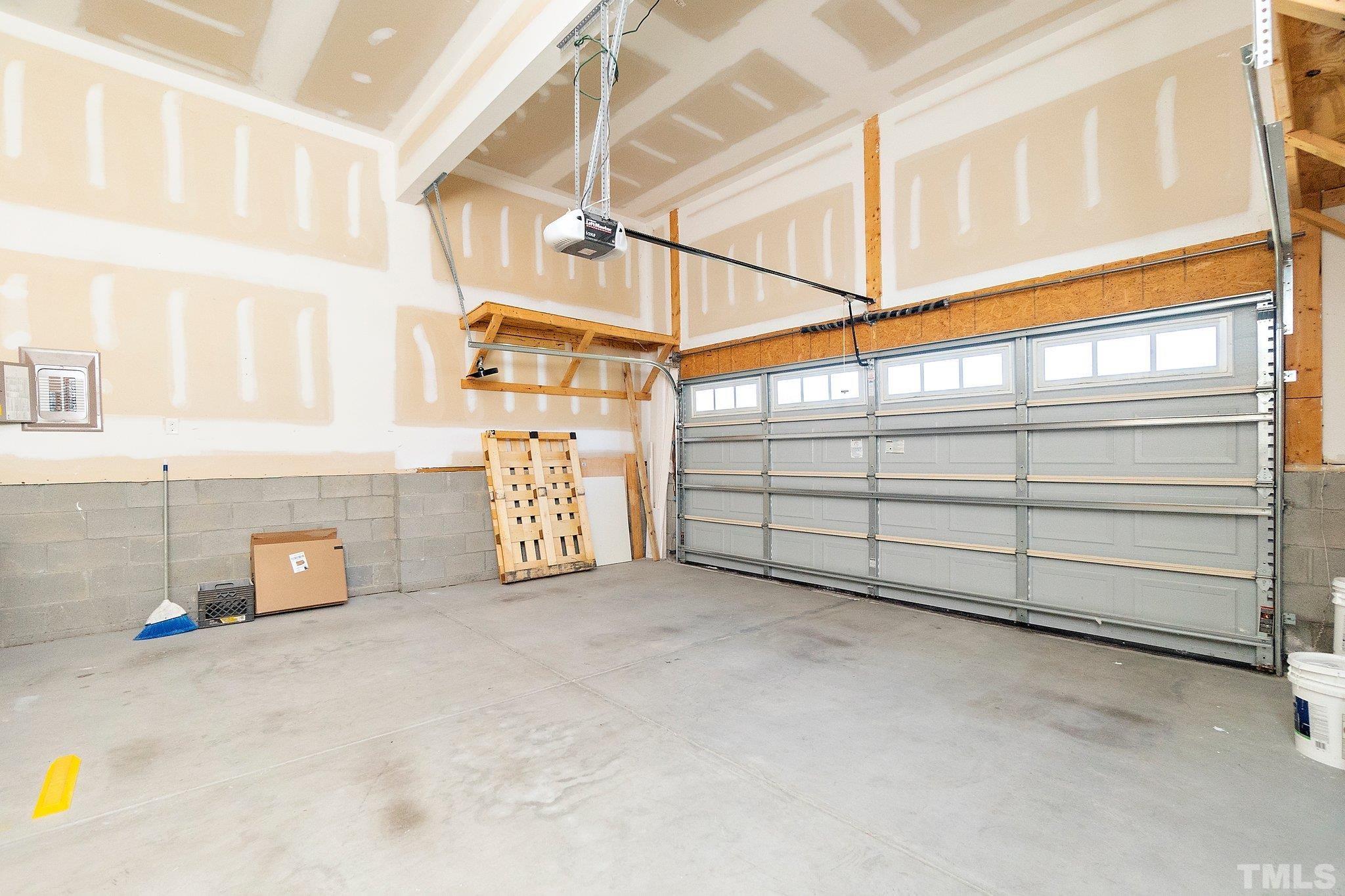 4401 Glengrove Road Raleigh, NC 27616 - Photo 21 of 26 a view of a garage with furniture and a window