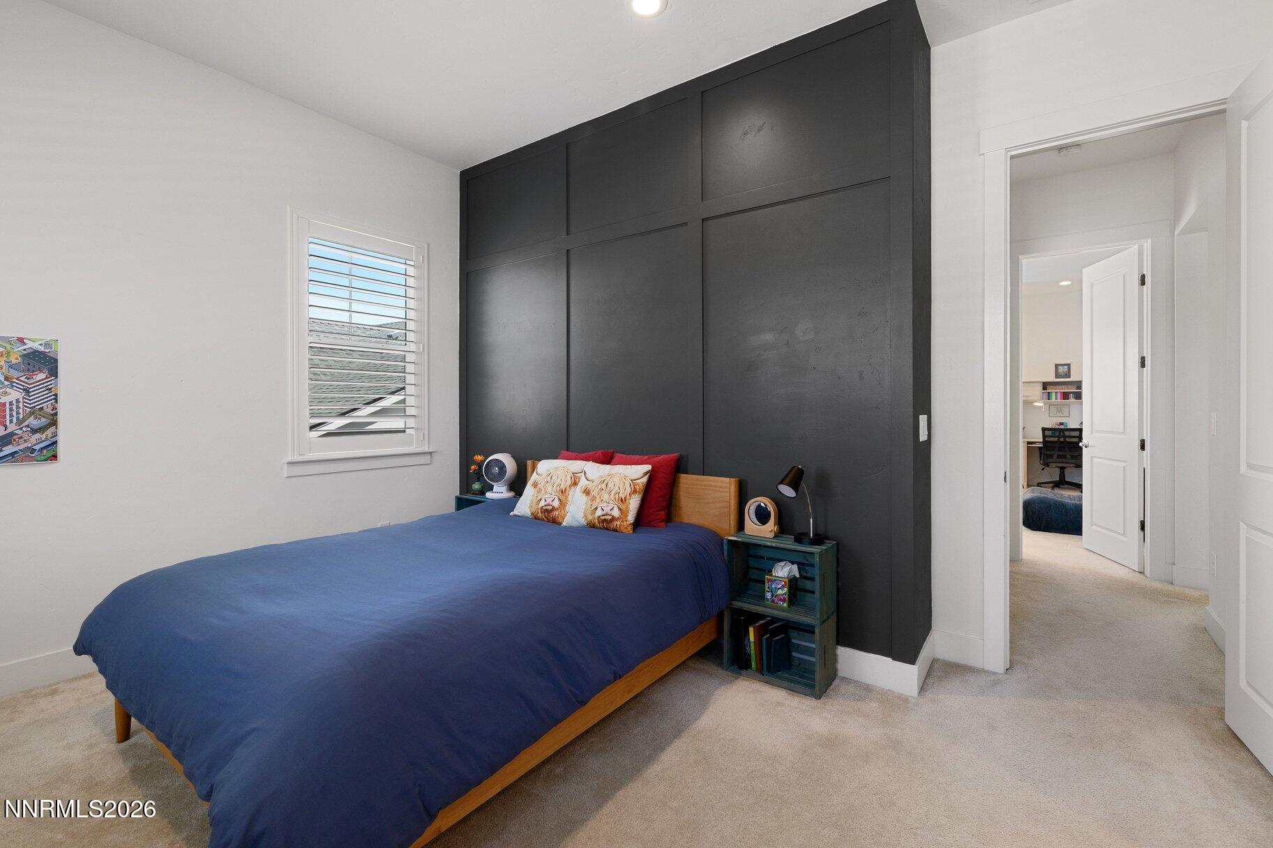 6110 South Pleasant Oak Trail Reno, NV 89511 - Photo 29 of 66 a bedroom with a bed and a window