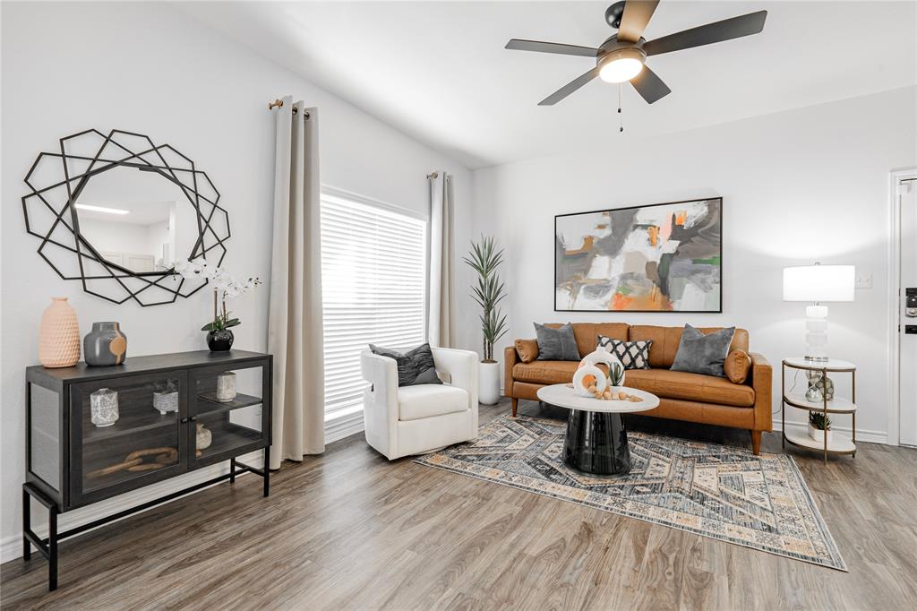 1600 North 9th Street, Unit A1R Midlothian, TX 76065 - Photo 11 of 15 a living room with furniture and a wooden floor