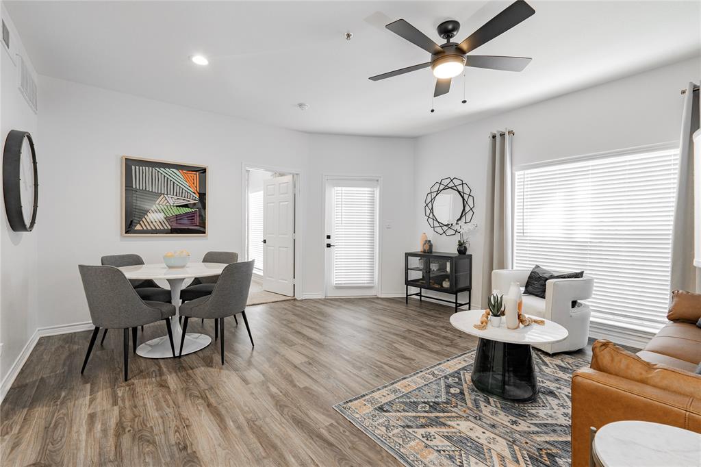 1600 North 9th Street, Unit A1R Midlothian, TX 76065 - Photo 8 of 15 a living room with furniture a table and wooden floor