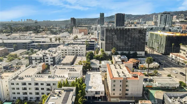 a front view of a building with street view