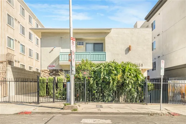 a view of a building along the street