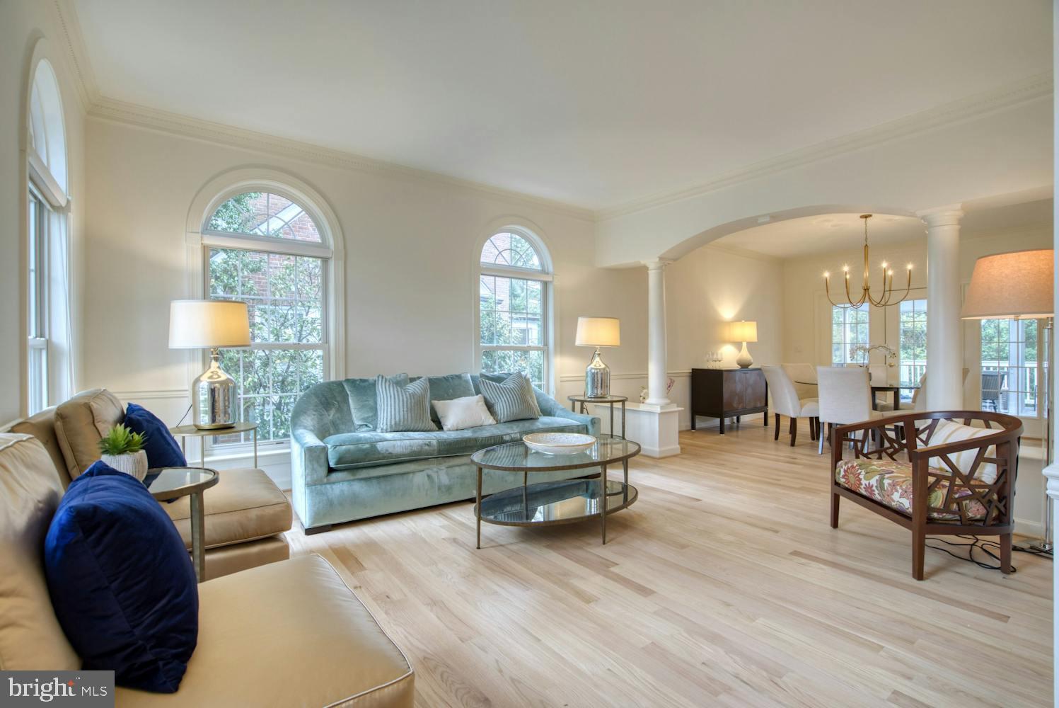 1702 South Arlington Ridge Road Arlington, VA 22202 - Photo 12 of 49 a living room with furniture and a large window