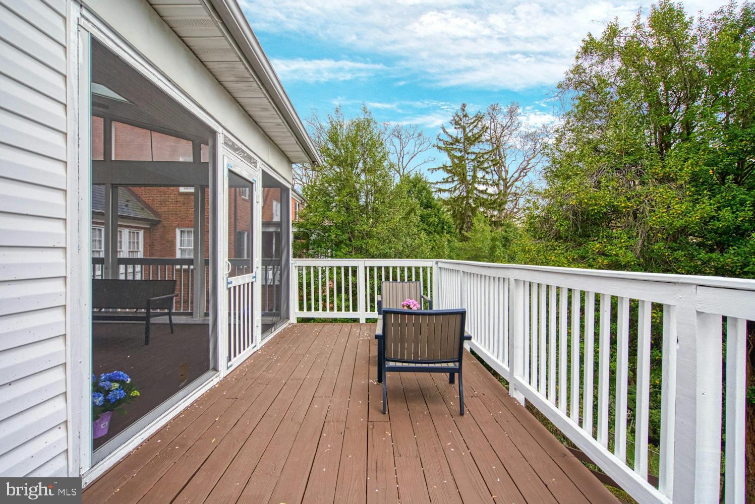 1702 South Arlington Ridge Road Arlington, VA 22202 - Photo 39 of 49 a view of a two chairs and table in a balcony