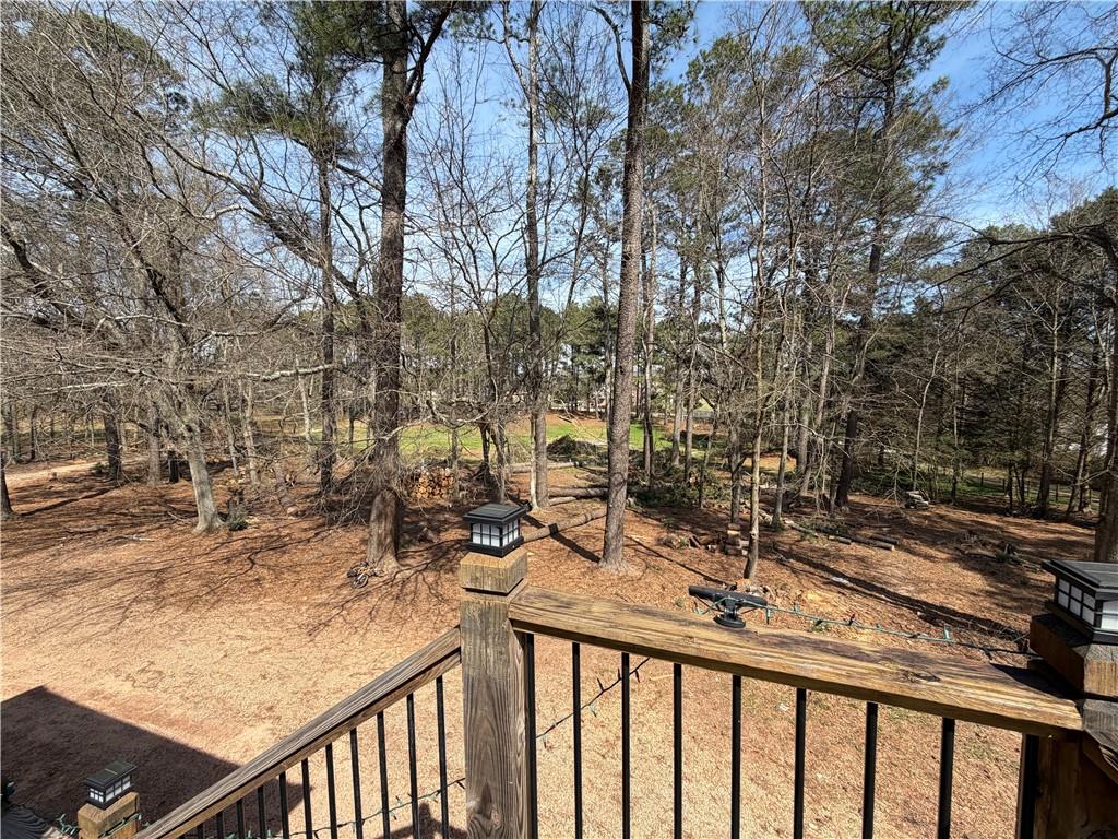 103 McElhannon Road Southeast Bethlehem, GA 30620 - Photo 15 of 20 a view of a forest filled with trees
