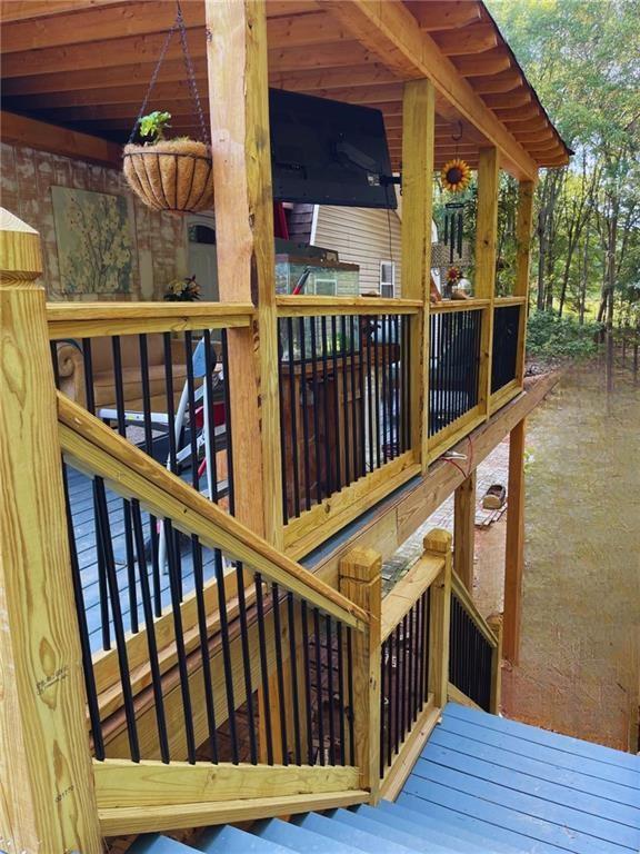 103 McElhannon Road Southeast Bethlehem, GA 30620 - Photo 3 of 20 a view of wooden deck