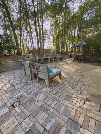 a view of a chairs and tables in the patio