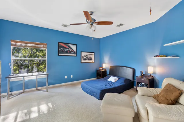 a en suite bathroom with a sink and mirror