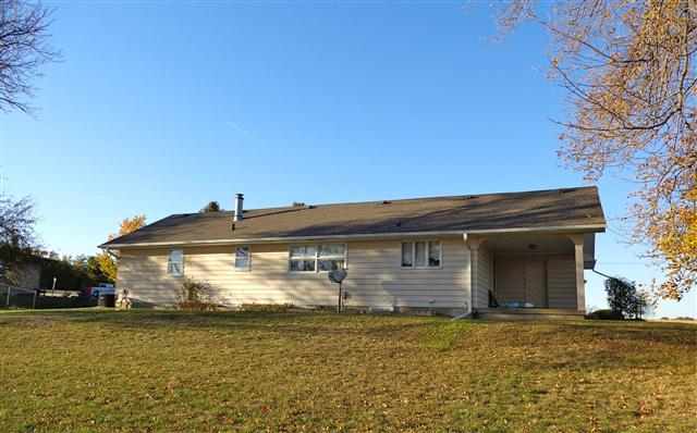 1076 West Becker School Road Freeport, IL 61032 - Photo 11 of 12 a front view of a house with a garden