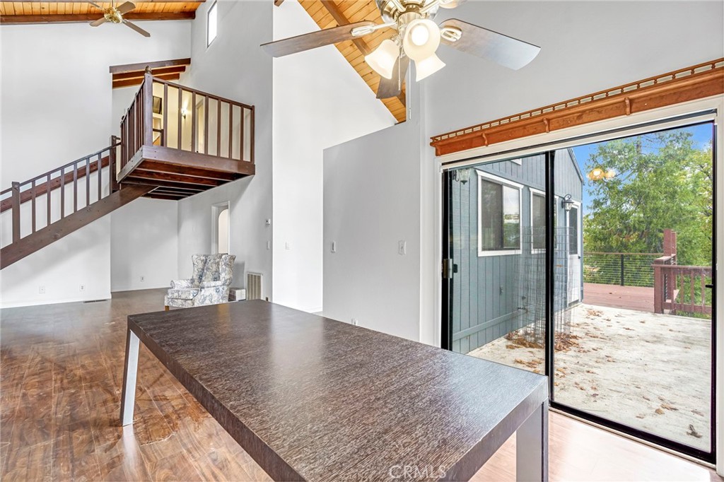 37068 Mudge Ranch Road Coarsegold, CA 93614 - Photo 10 of 53 a view of a living room and a balcony