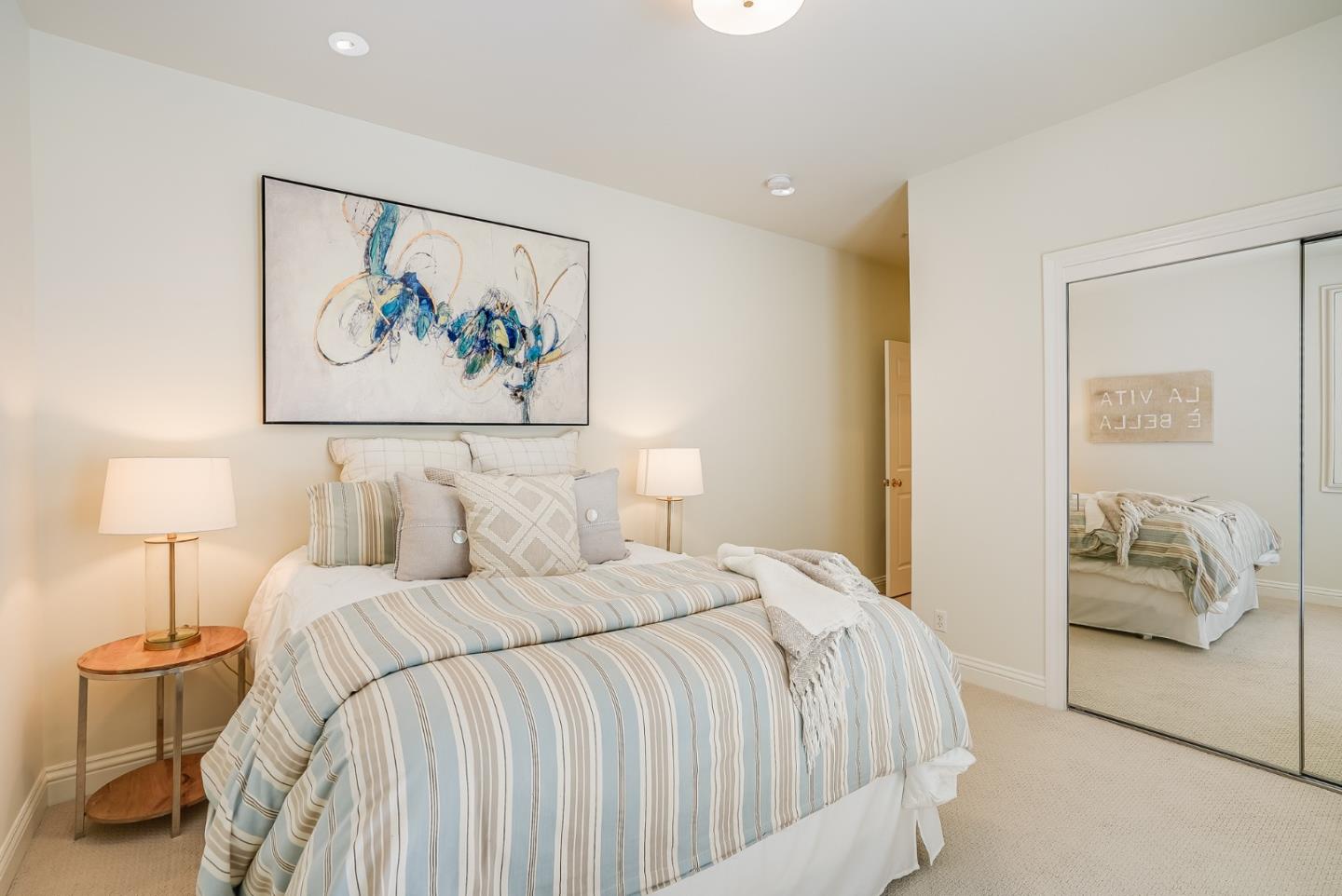 75 Riordan Place Menlo Park, CA 94025 - Photo 21 of 55 a bedroom with a bed and a lamp