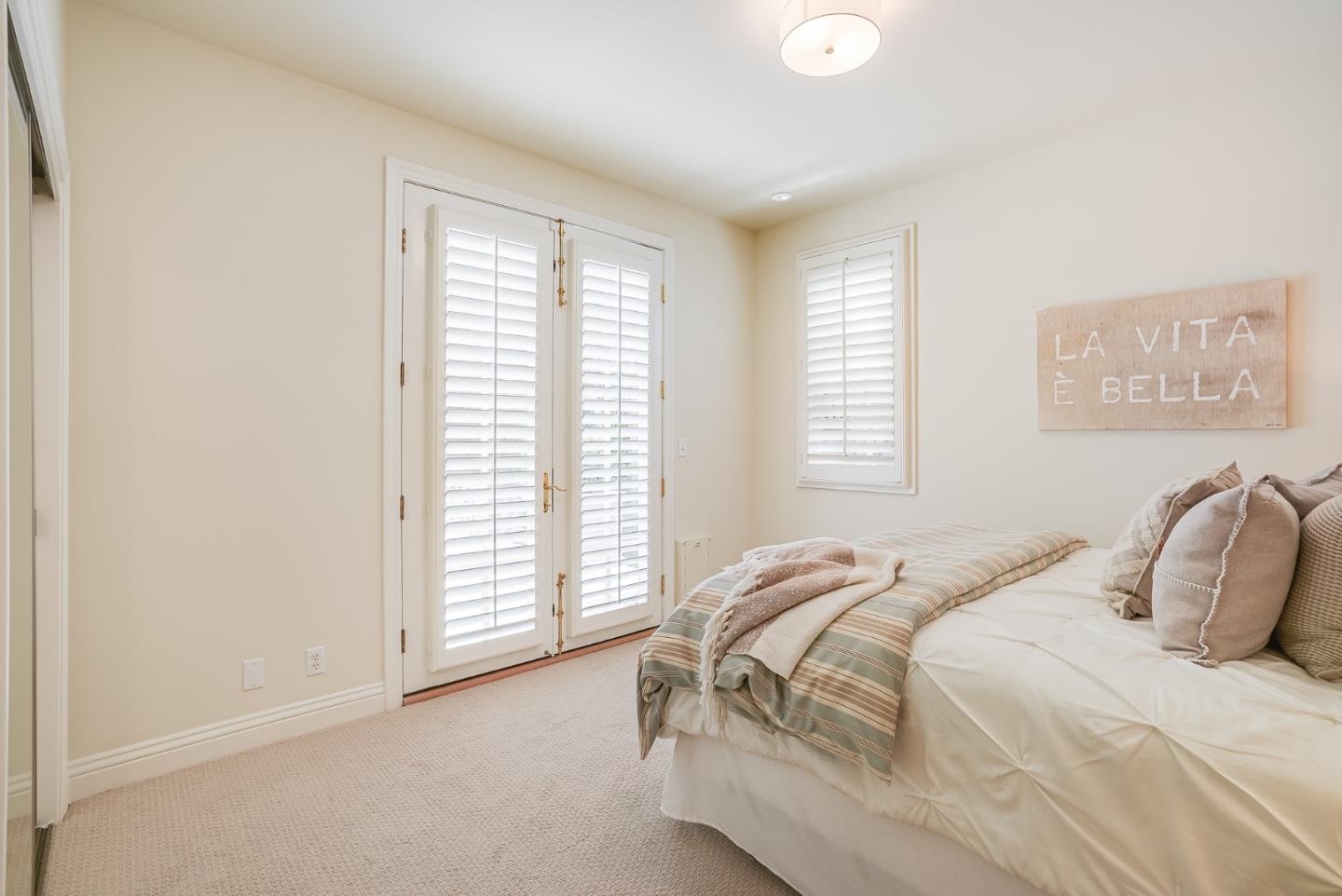 75 Riordan Place Menlo Park, CA 94025 - Photo 22 of 55 a bedroom with a bed and a window