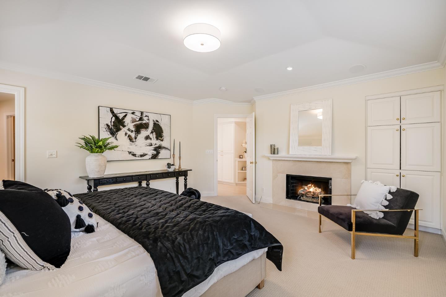 75 Riordan Place Menlo Park, CA 94025 - Photo 32 of 55 a bedroom with a bed and a fireplace