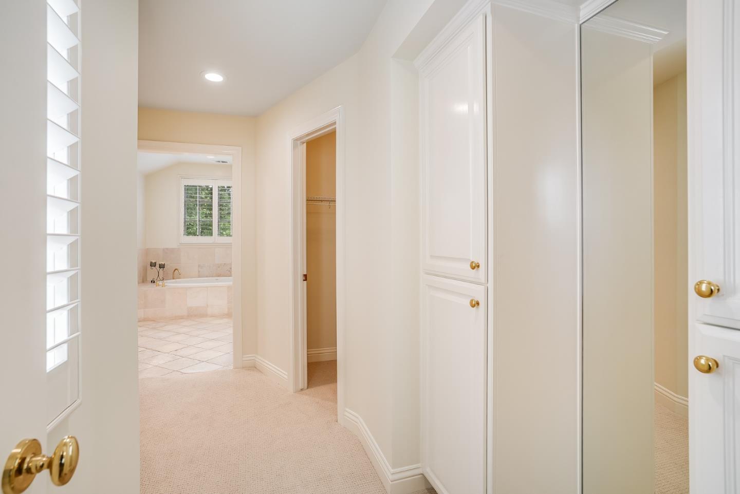 75 Riordan Place Menlo Park, CA 94025 - Photo 34 of 55 a view of a hallway with wooden floor and a bathroom