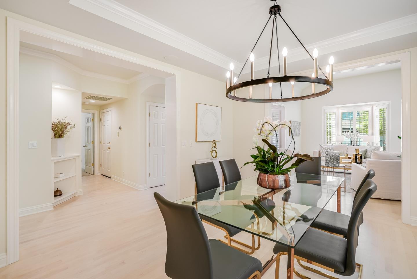 75 Riordan Place Menlo Park, CA 94025 - Photo 9 of 55 a view of a dining room with furniture wooden floor and chandelier