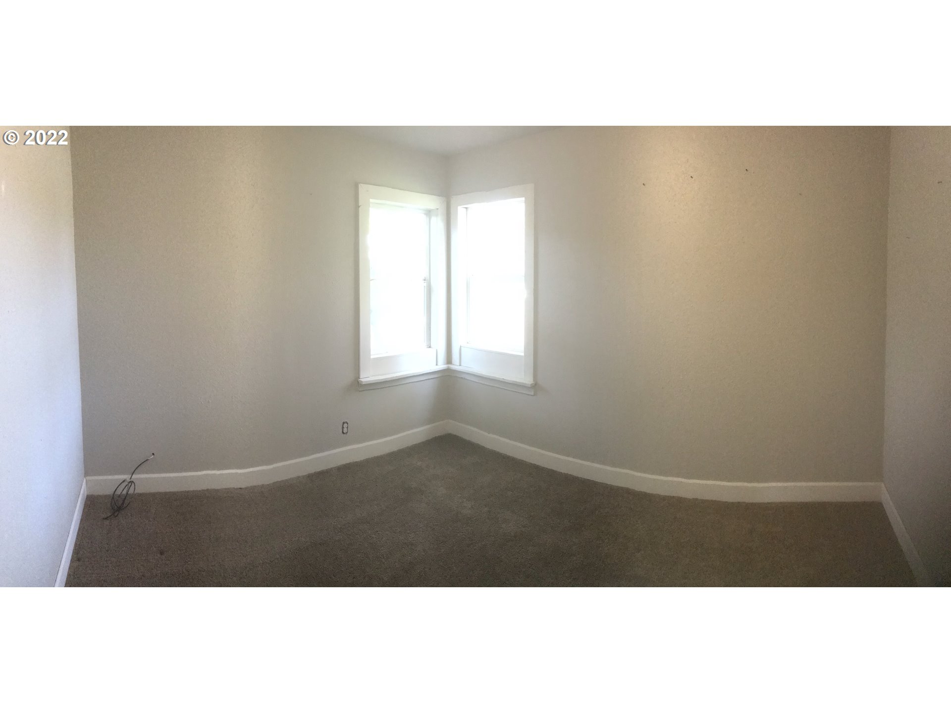 1470 Waite Street Eugene, OR 97402 - Photo 17 of 20 a view of an empty room with a window