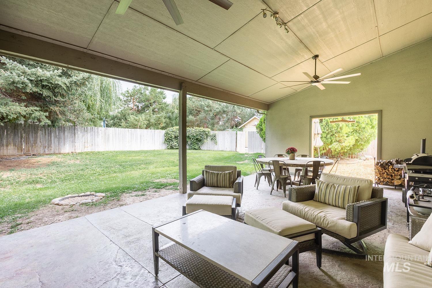 7166 South Cloverdale Road Boise, ID 83709 - Photo 22 of 50 Covered patio with stamped concrete flooring, dual ceiling fans, and recessed lighting