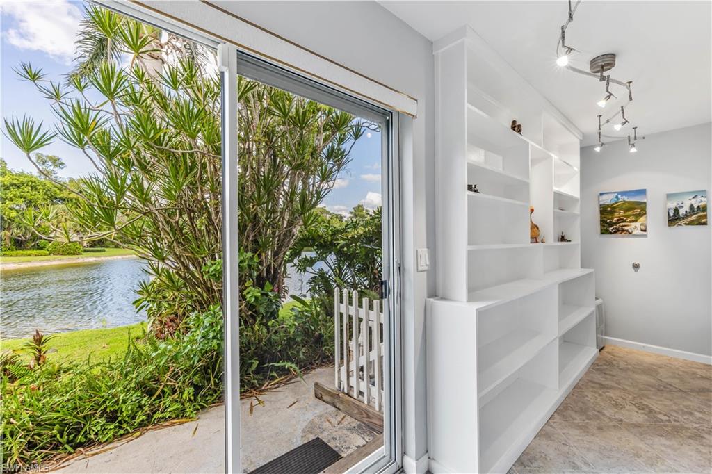 550 Bald Eagle Drive Naples, FL 34105 - Photo 23 of 37 a view of a living room and natural light