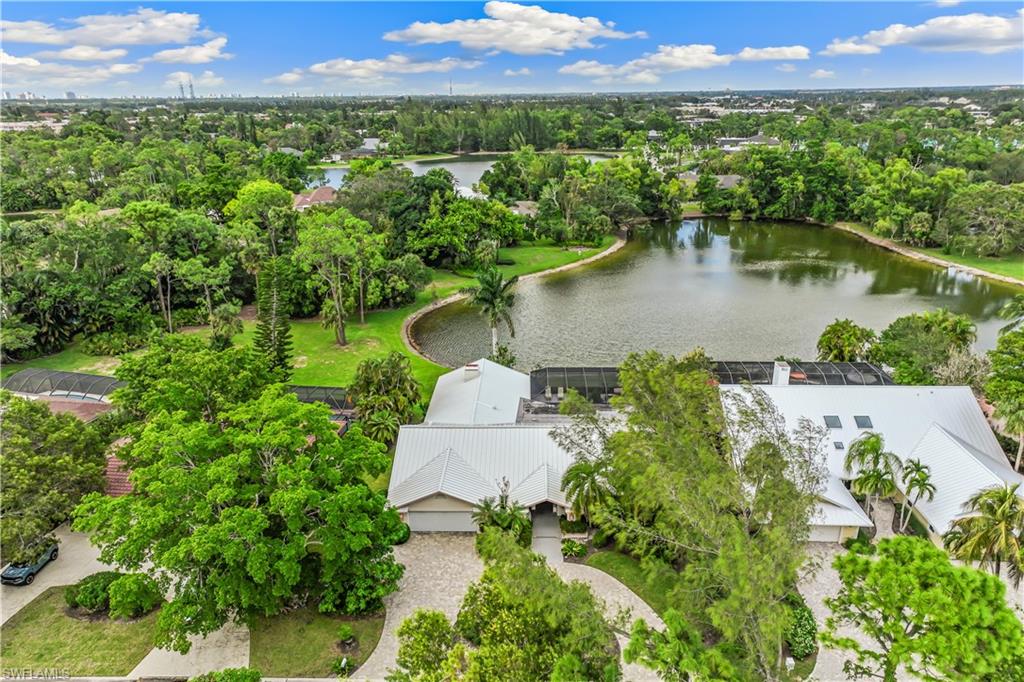 550 Bald Eagle Drive Naples, FL 34105 - Photo 34 of 37 an aerial view of residential house with outdoor space and swimming pool