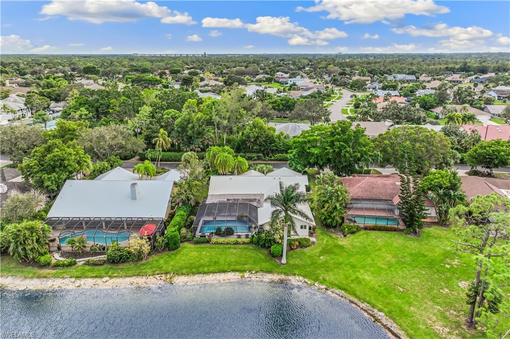550 Bald Eagle Drive Naples, FL 34105 - Photo 35 of 37 an aerial view of a house with a garden and outdoor space