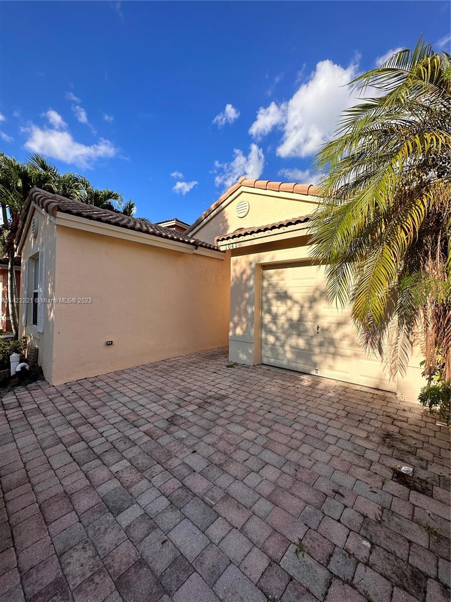 1041 Southeast 20th Road Homestead, FL 33035 - Photo 2 of 40 a view of a garage