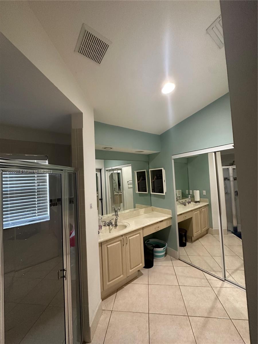 1041 Southeast 20th Road Homestead, FL 33035 - Photo 25 of 40 a kitchen with a sink and counter top space