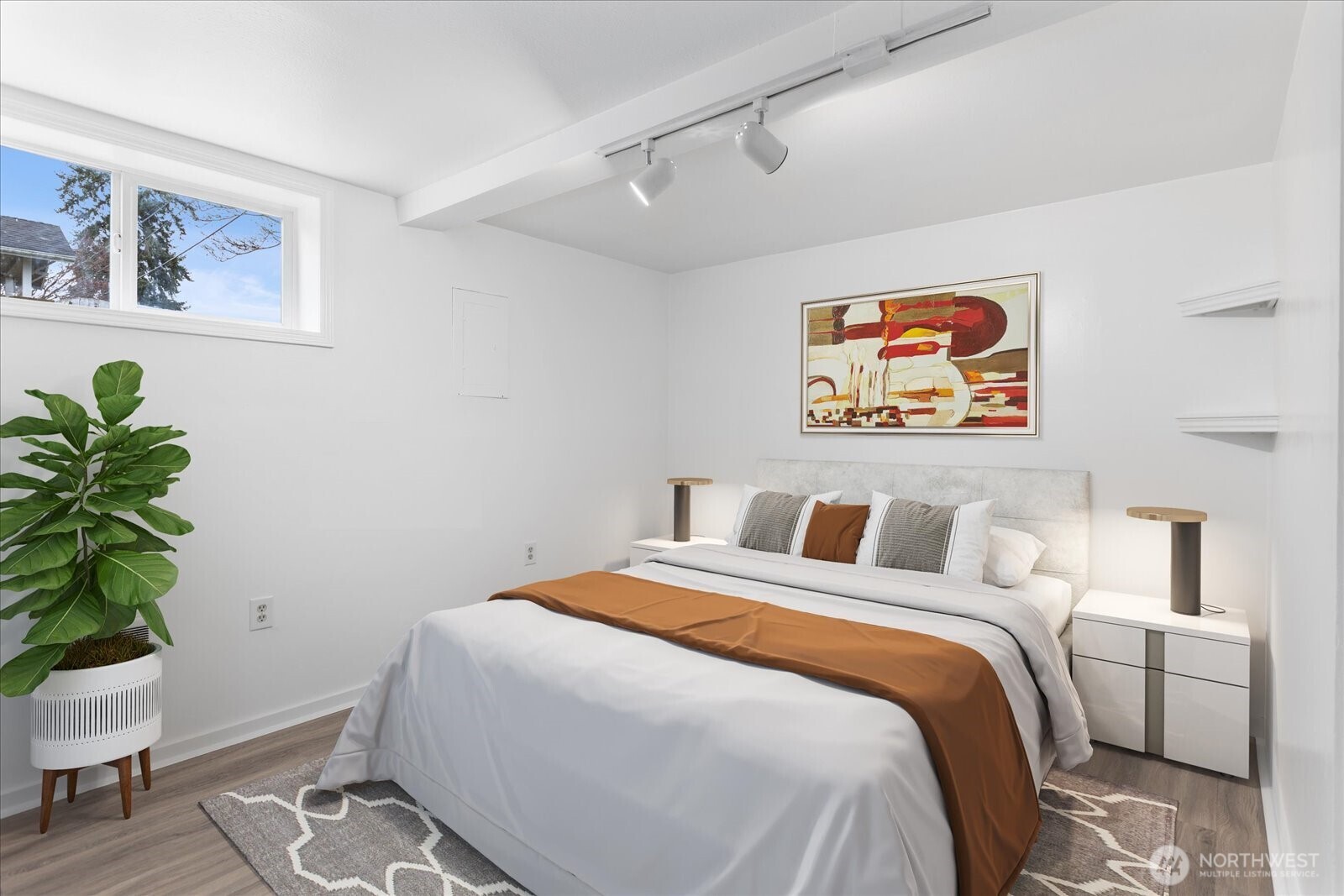 1016 Rockefeller Avenue Everett, WA 98201 - Photo 14 of 29 a bedroom with a bed and a painting on the wall