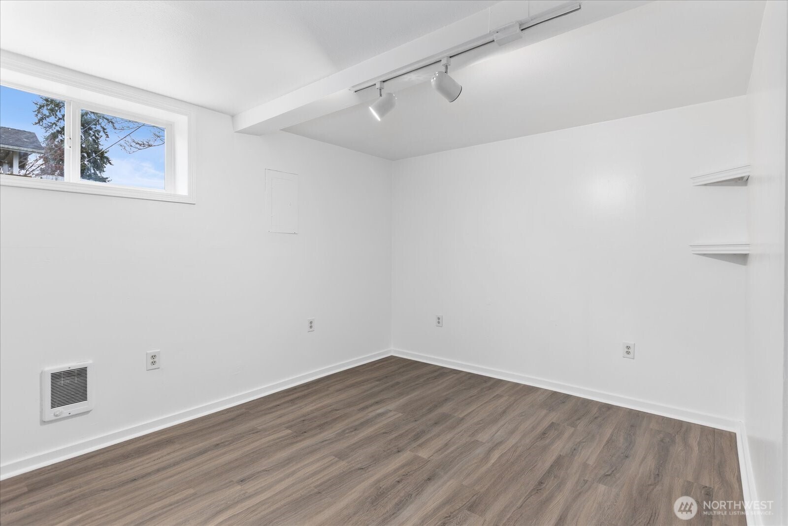 1016 Rockefeller Avenue Everett, WA 98201 - Photo 17 of 29 a view of a room with wooden floor and window