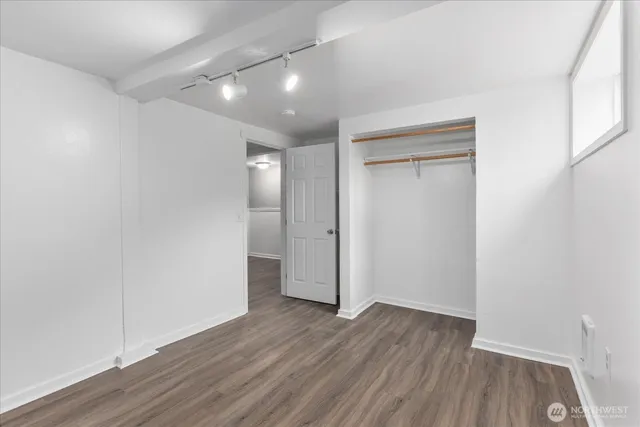 a view of storage and utility room with washer and dryer