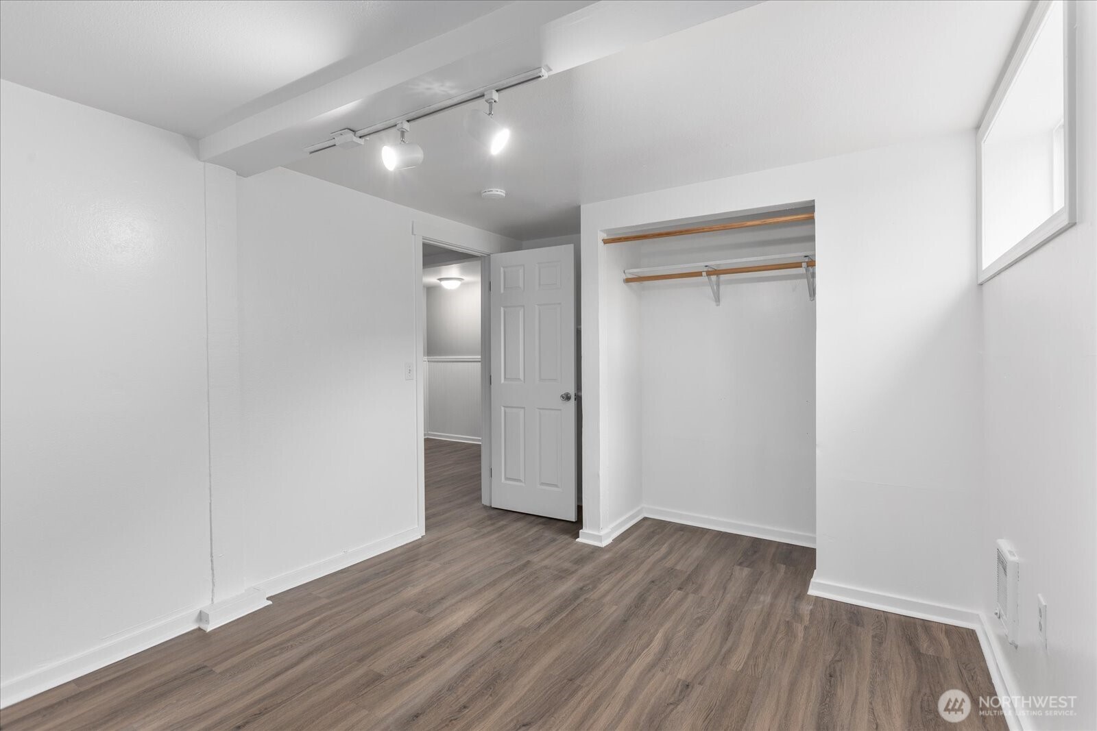 1016 Rockefeller Avenue Everett, WA 98201 - Photo 18 of 29 wooden floor in an empty room with a window