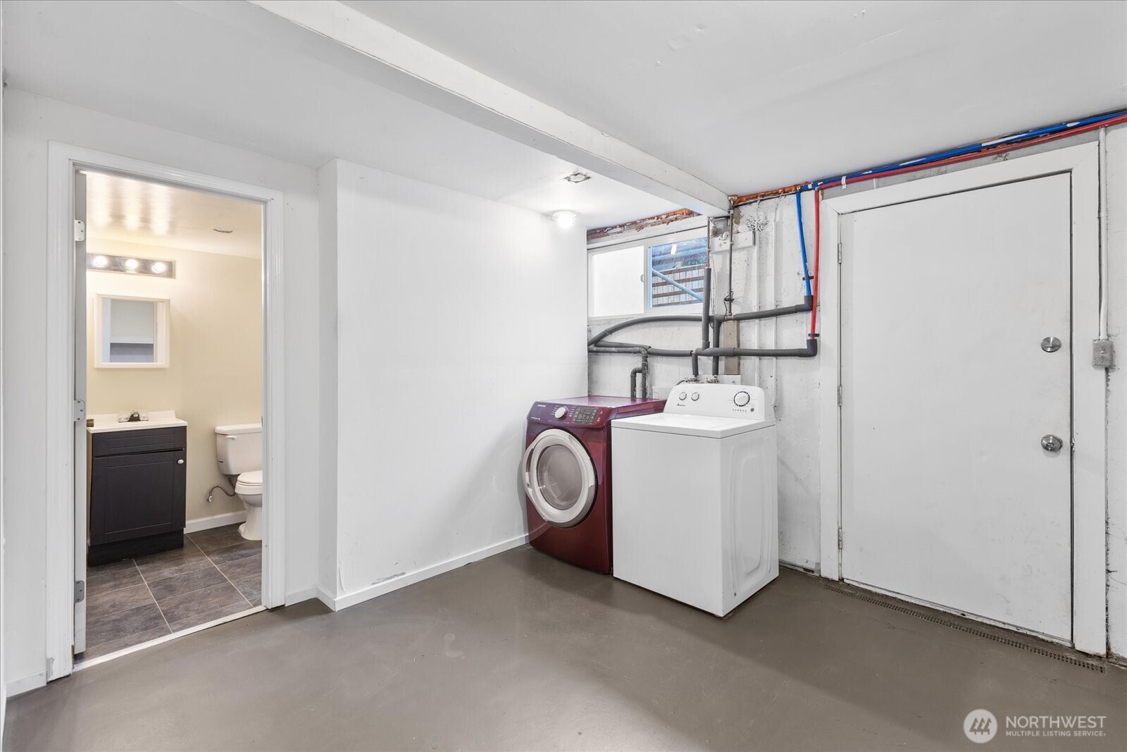 1016 Rockefeller Avenue Everett, WA 98201 - Photo 19 of 29 a view of storage and utility room with washer and dryer