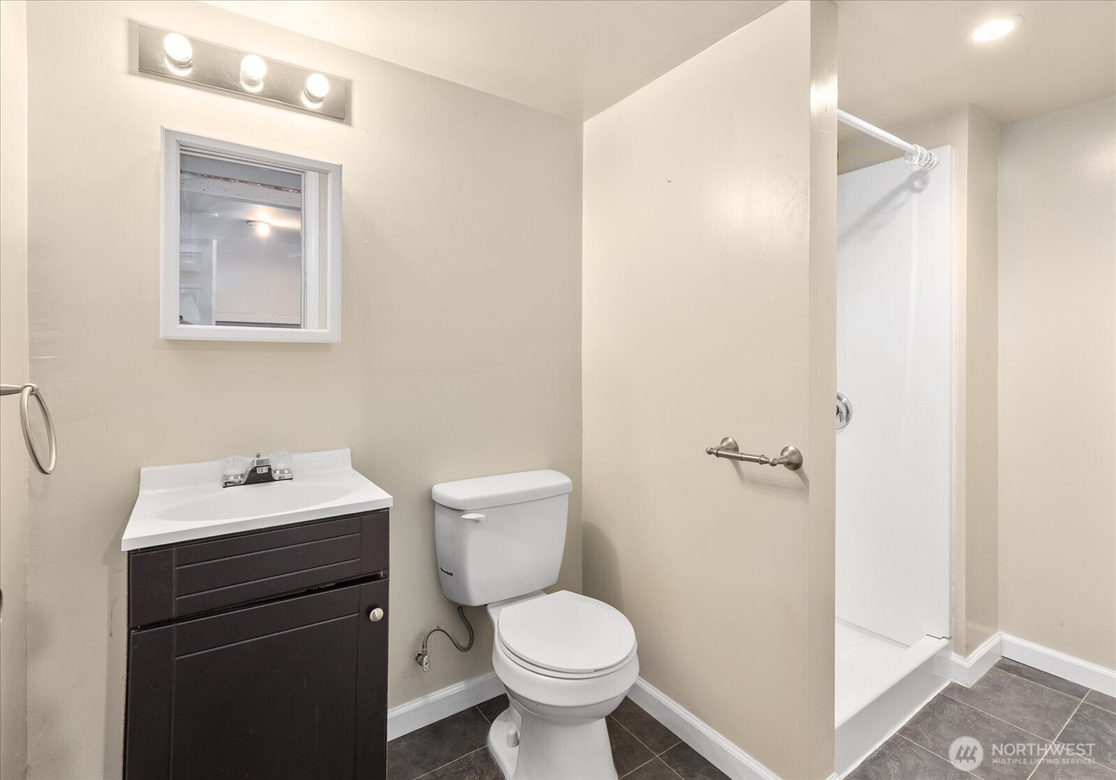 1016 Rockefeller Avenue Everett, WA 98201 - Photo 20 of 29 a bathroom with a toilet sink and mirror