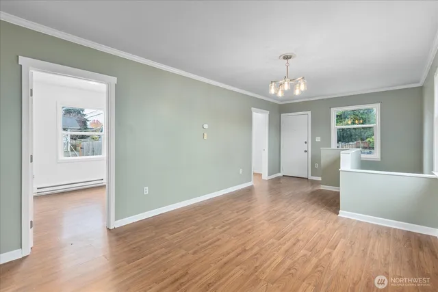 a kitchen with a sink and a refrigerator