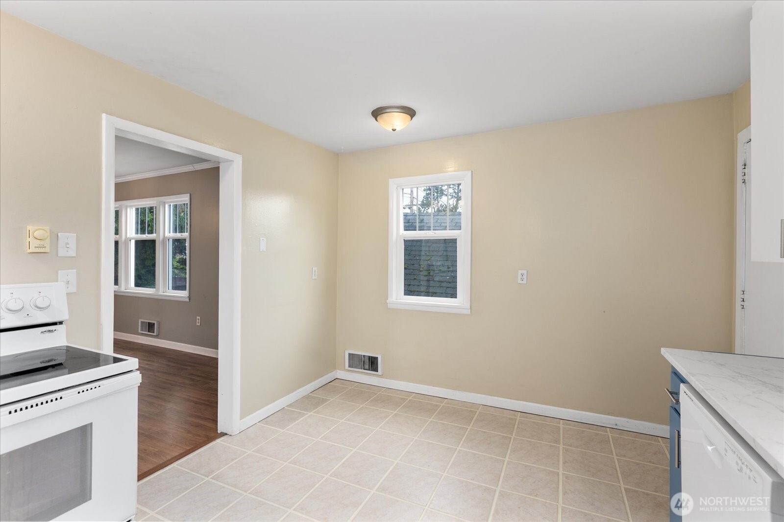 1016 Rockefeller Avenue Everett, WA 98201 - Photo 8 of 29 a view of a kitchen with a sink cabinets and a window