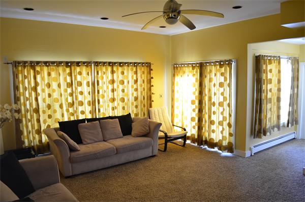 261 Marrett Road Lexington, MA 02421 - Photo 8 of 24 a living room with furniture and a large window