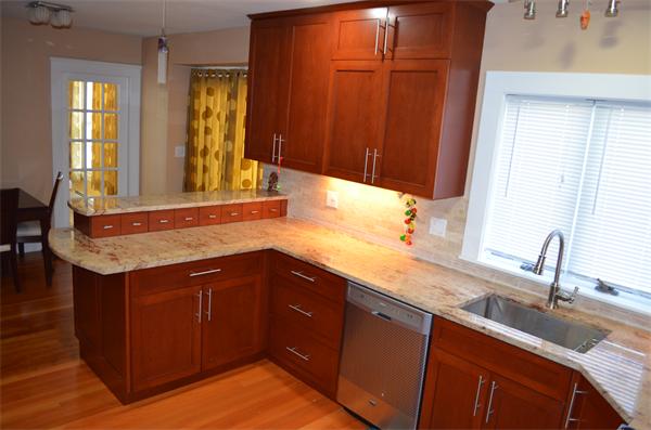 261 Marrett Road Lexington, MA 02421 - Photo 10 of 24 a bathroom with a sink and a mirror