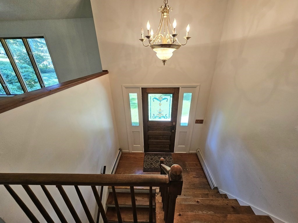 47 Stagecoach Road Amherst, MA 01002 - Photo 18 of 38 a view of a dining room with furniture window and wooden floor
