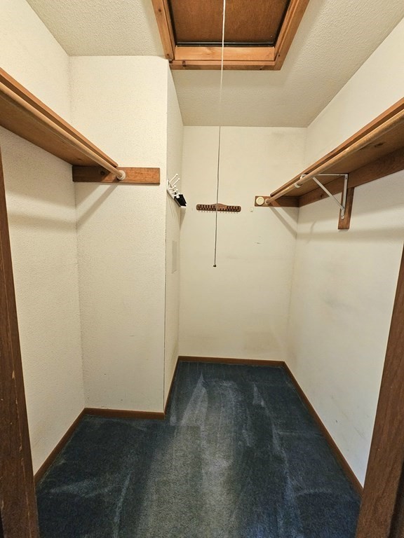 47 Stagecoach Road Amherst, MA 01002 - Photo 26 of 38 a view of small space with racks on the wall