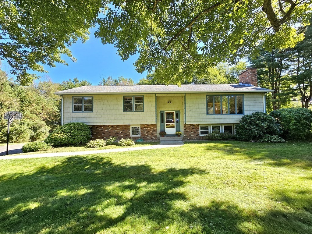 47 Stagecoach Road Amherst, MA 01002 - Photo 3 of 38 a front view of house with yard and green space