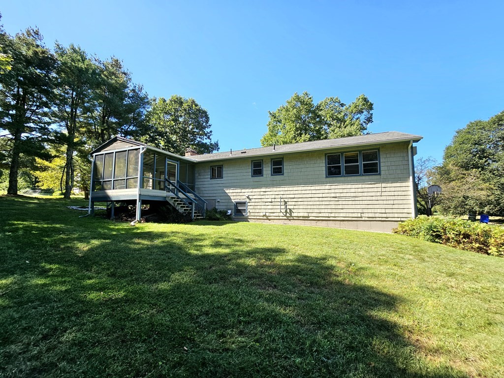 47 Stagecoach Road Amherst, MA 01002 - Photo 37 of 38 a front view of a house with a yard