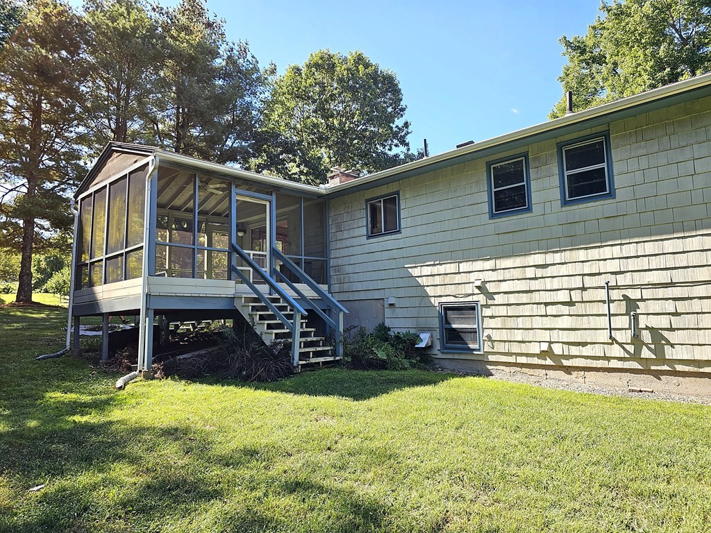 47 Stagecoach Road Amherst, MA 01002 - Photo 38 of 38 front view of a house with a yard